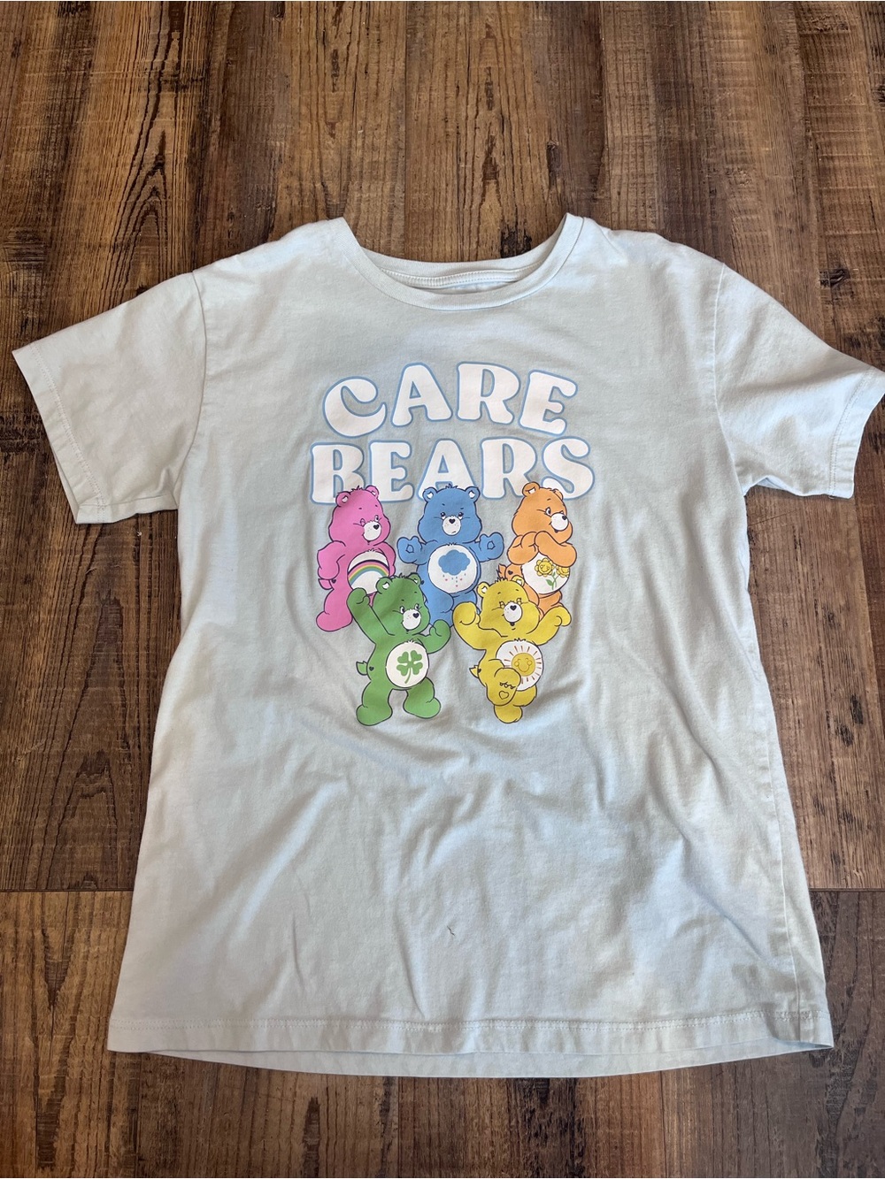 Care Bears Short Sleeve Tee in Pale Blue with Multicolor Bears